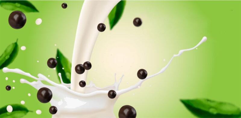 Tea with milk and tapioca. Splash of milk. Vector realistic illustration.