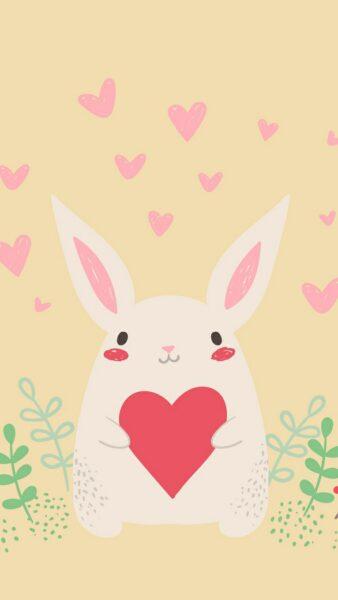 Hình nền thỏ cầm trái tim đỏ siêu cute
